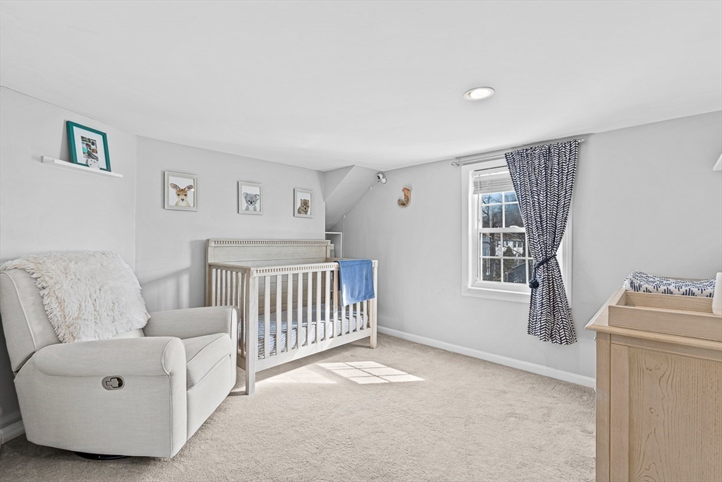 80 Neal Street Malden, MA 02148 - Photo 19 of 39 a bedroom with furniture and a window