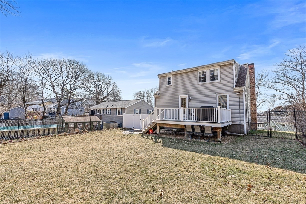 80 Neal Street Malden, MA 02148 - Photo 33 of 39 a view of a house with a yard and sitting area