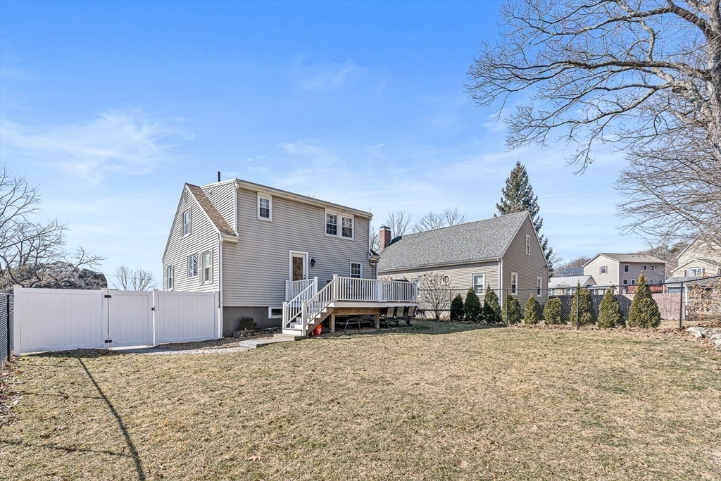 80 Neal Street Malden, MA 02148 - Photo 34 of 39 a front view of a house with a yard