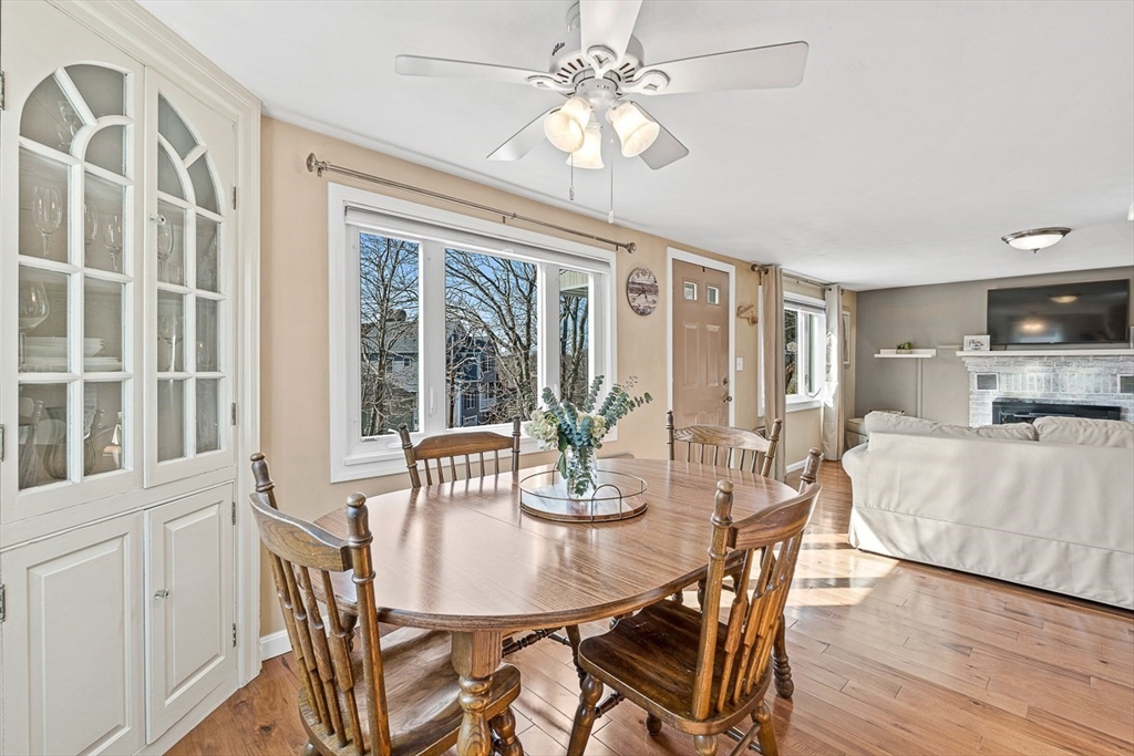 80 Neal Street Malden, MA 02148 - Photo 7 of 39 a view of a dining room with furniture window and wooden floor