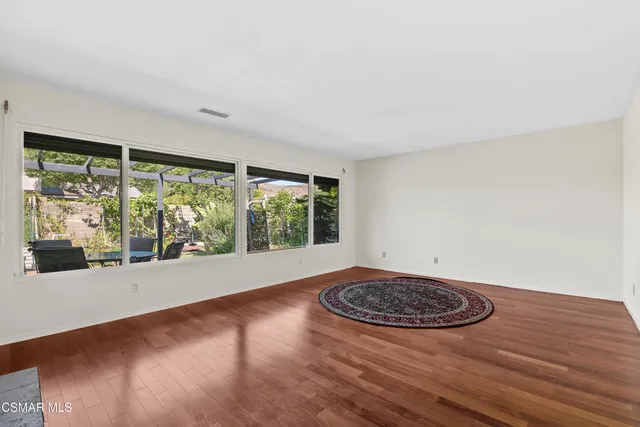 a view of a room with a large window