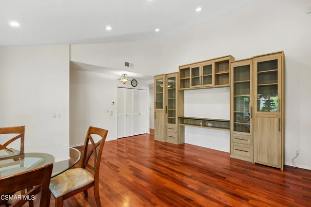 a view of a livingroom with furniture and wooden floor