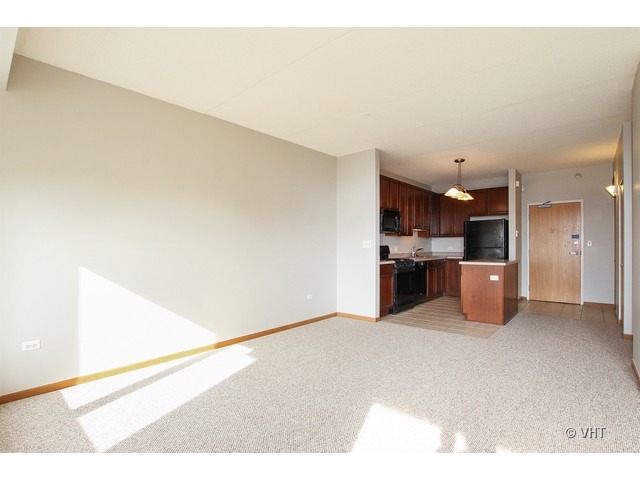 515 Main Street, Unit 507 Evanston, IL 60202 - Photo 6 of 10 a view of a kitchen with a sink