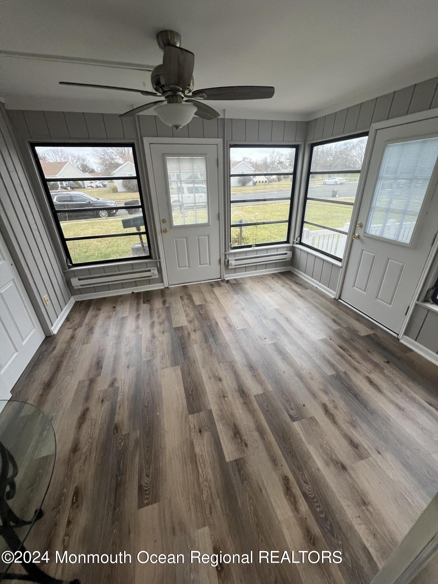 93 Halls Croft Road, Unit D Freehold, NJ 07728 - Photo 13 of 17 a view of an empty room with a window