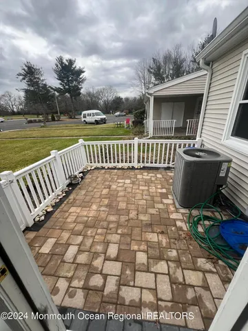 a view of a chairs and table on the terrace
