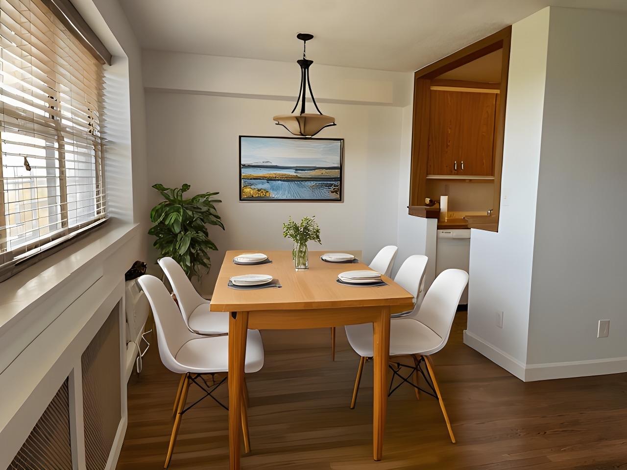88-29 155th Avenue, Unit 6D Queens, NY 11414 - Photo 14 of 16 a dining room with furniture and window