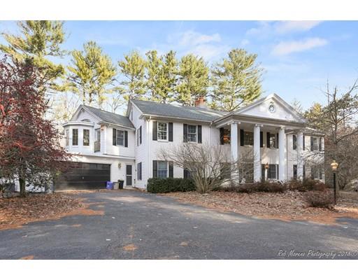 216 Haverhill Road Topsfield, MA 01983 - Photo 1 of 28 a front view of a house with a yard