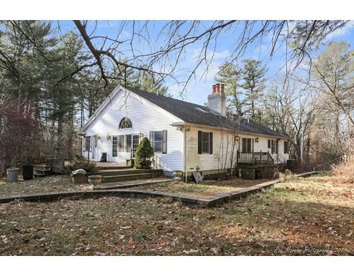 216 Haverhill Road Topsfield, MA 01983 - Photo 3 of 28 a front view of a house with a yard
