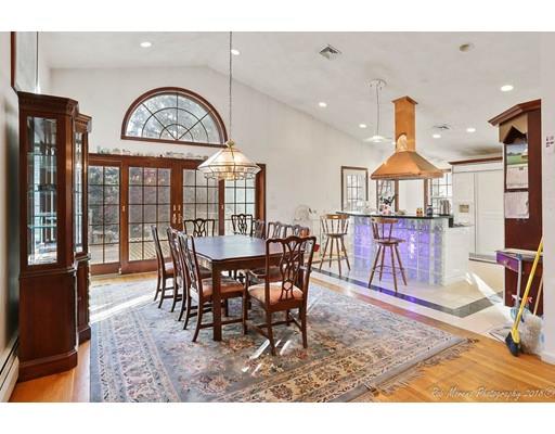 216 Haverhill Road Topsfield, MA 01983 - Photo 7 of 28 a view of a dining room with furniture window and wooden floor