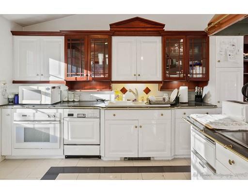 216 Haverhill Road Topsfield, MA 01983 - Photo 10 of 28 a kitchen with granite countertop a sink cabinets and stainless steel appliances