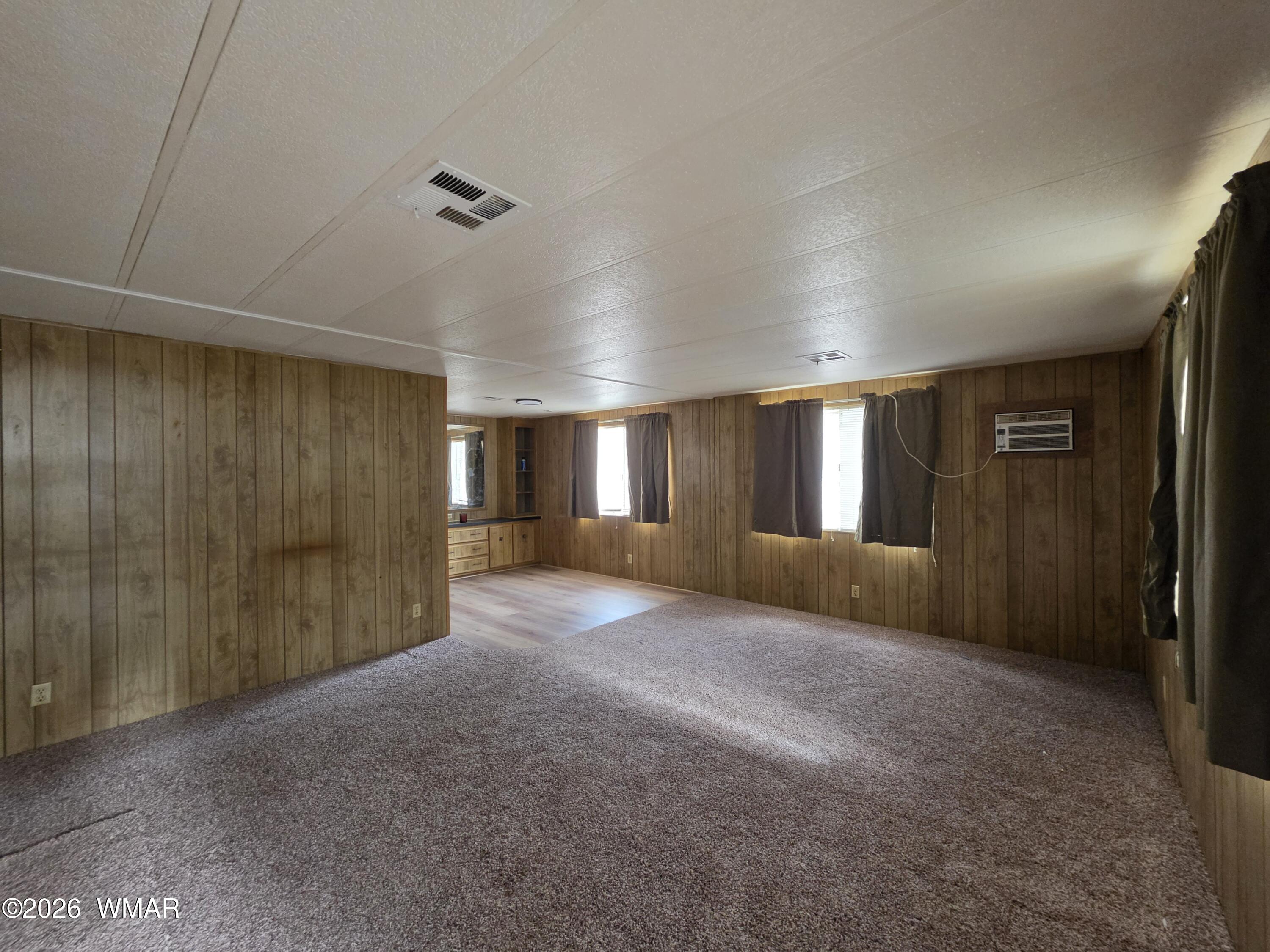 2800 South White Mountain Road, Unit 84 Show Low, AZ 85901 - Photo 4 of 13 a view of a livingroom with a staircase