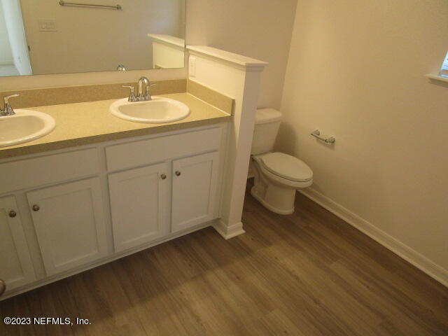 4165 Deer Trce Lane Jacksonville, FL 32257 - Photo 12 of 13 a bathroom with a sink and a toilet