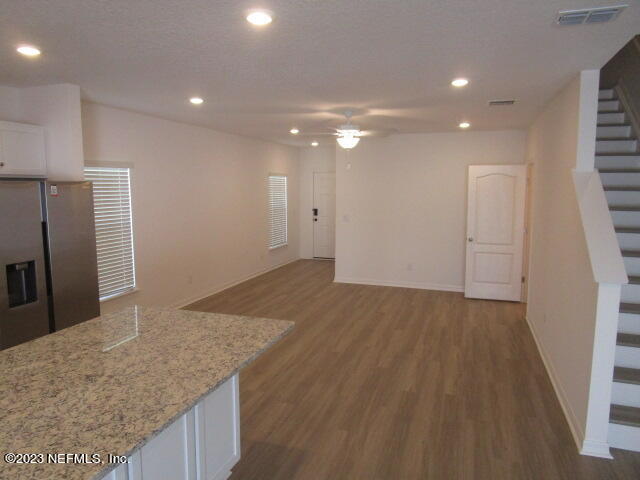 4165 Deer Trce Lane Jacksonville, FL 32257 - Photo 2 of 13 a view of kitchen island wooden floor