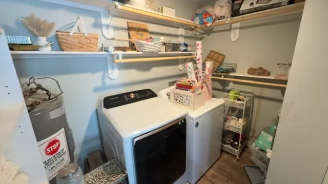 a utility room with dryer and washer