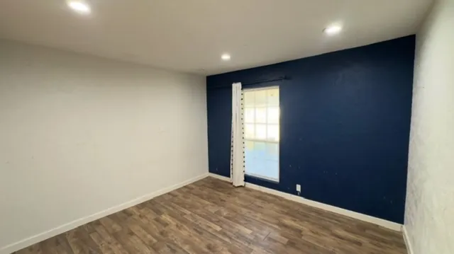 an empty room with windows