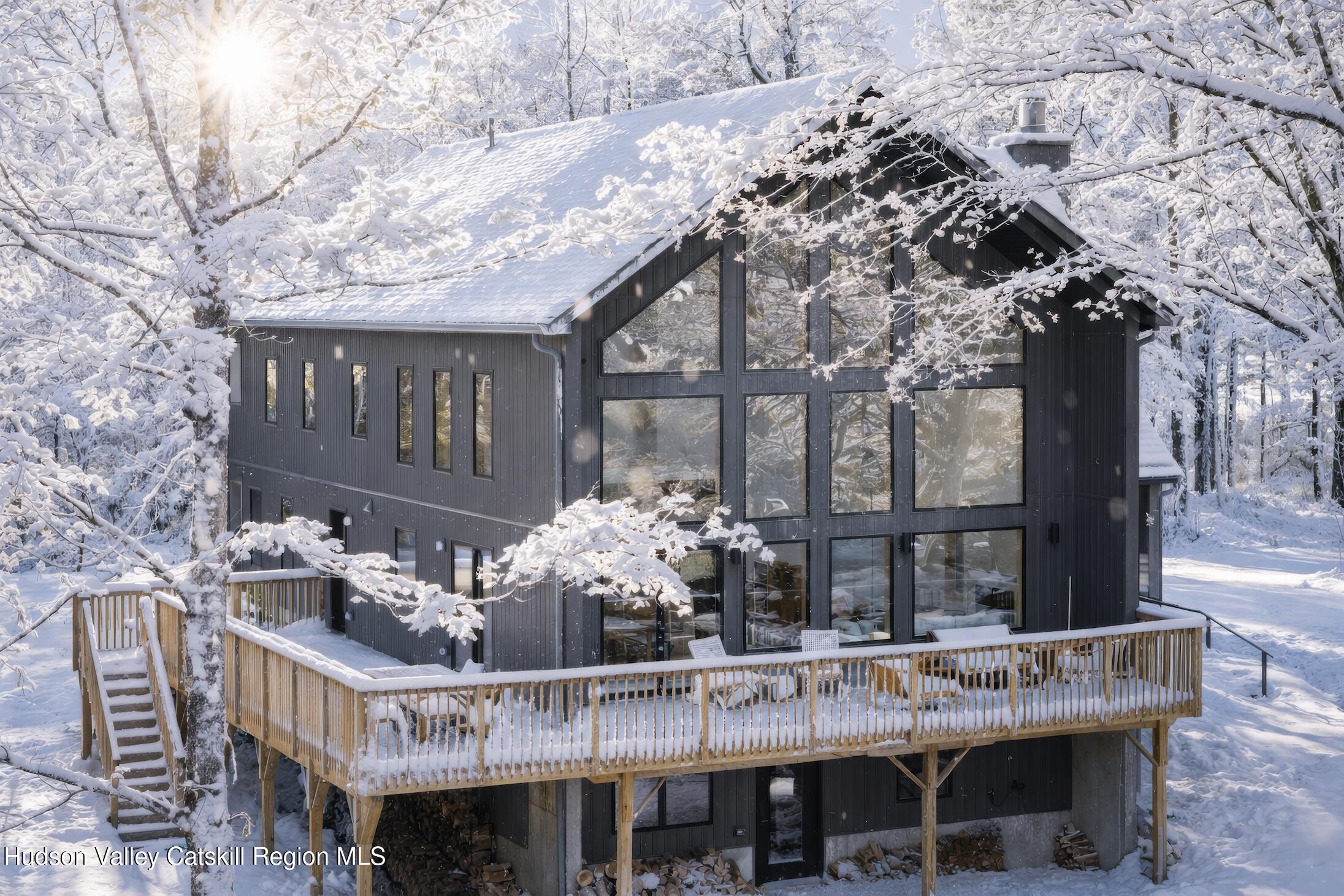 a view of a chairs and table in the patio