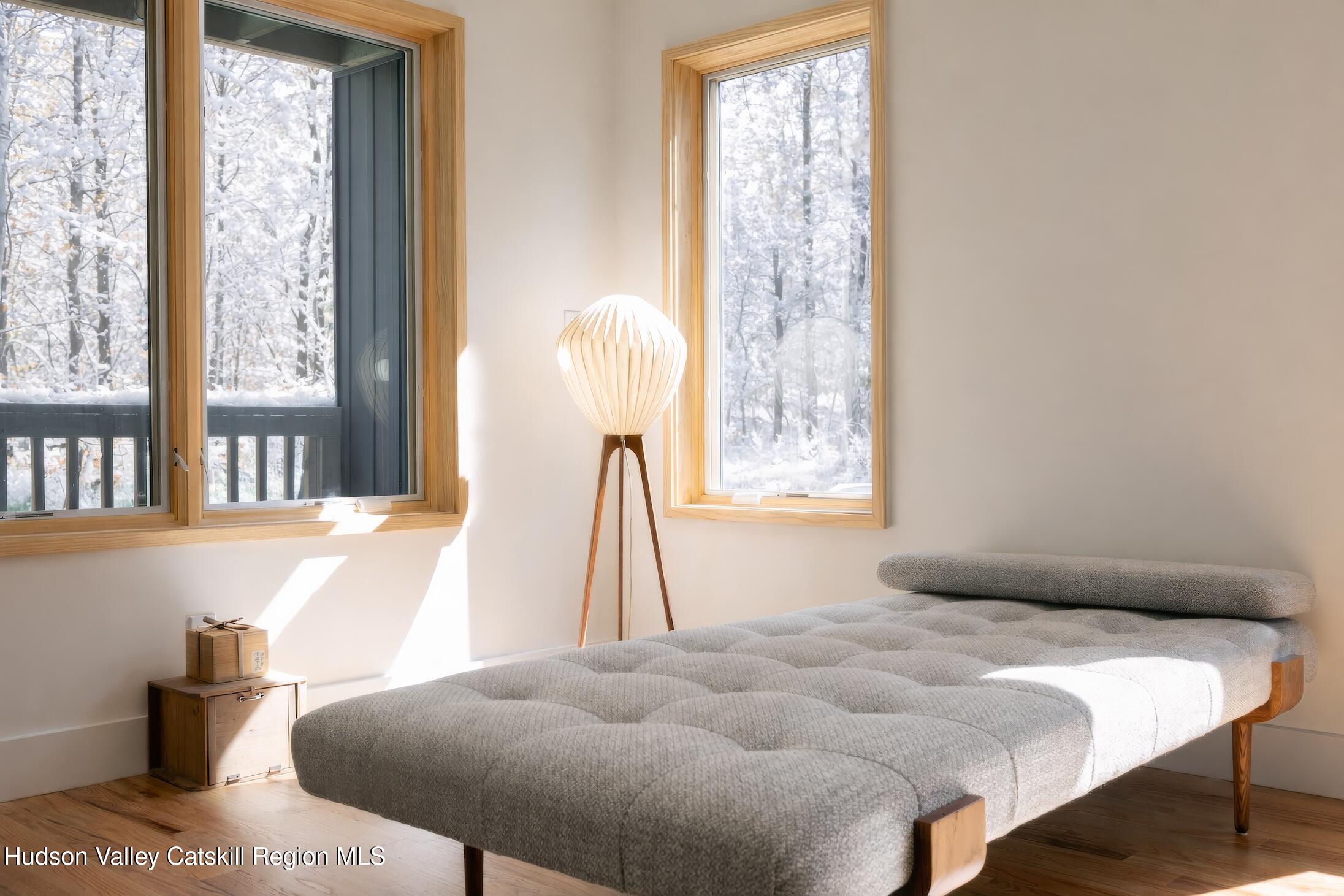 130 Abromowitz Road Wawarsing, NY 12428 - Photo 15 of 27 a bedroom with a bed and a large window