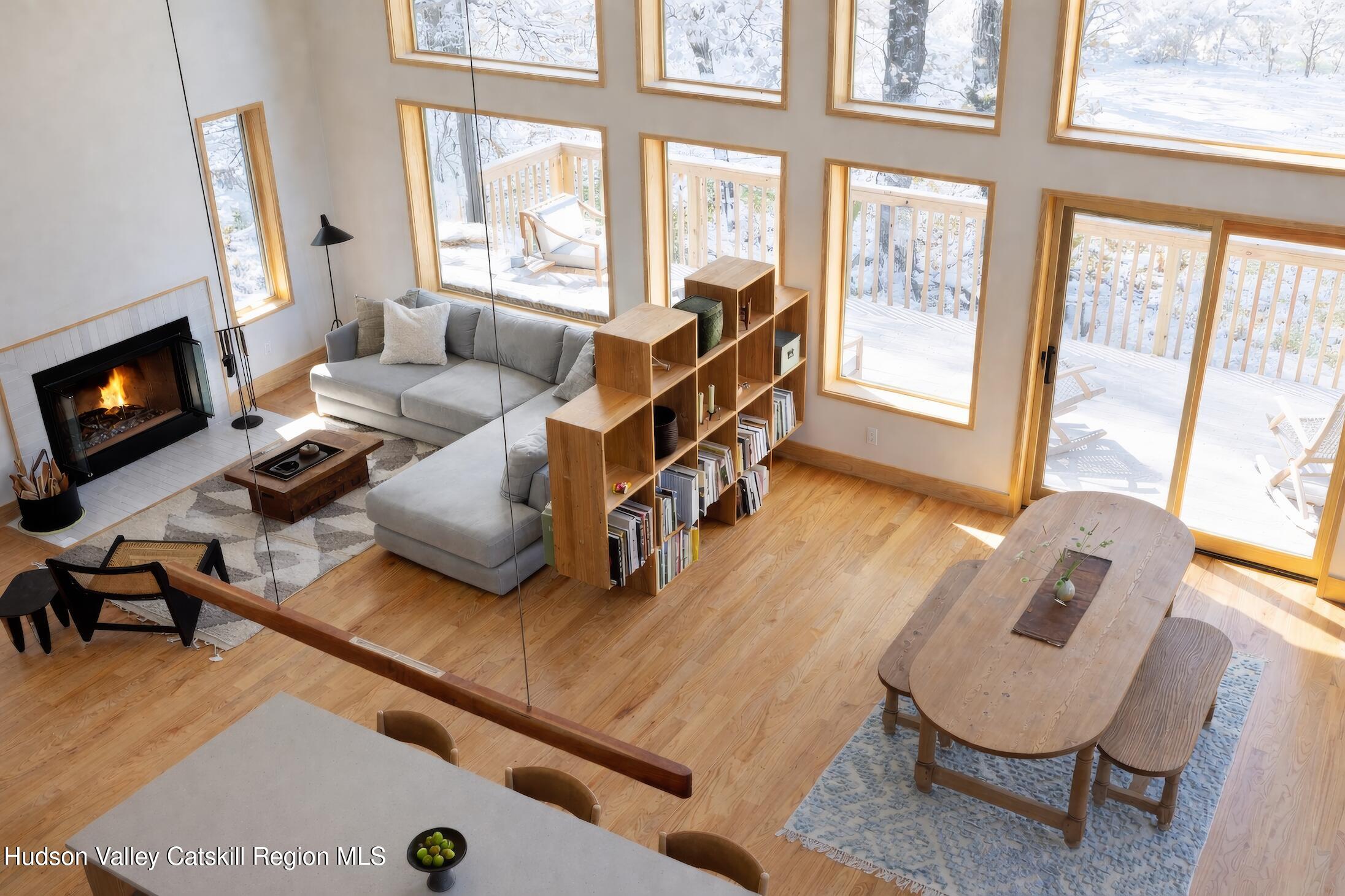 130 Abromowitz Road Wawarsing, NY 12428 - Photo 8 of 27 a living room with furniture and a fireplace