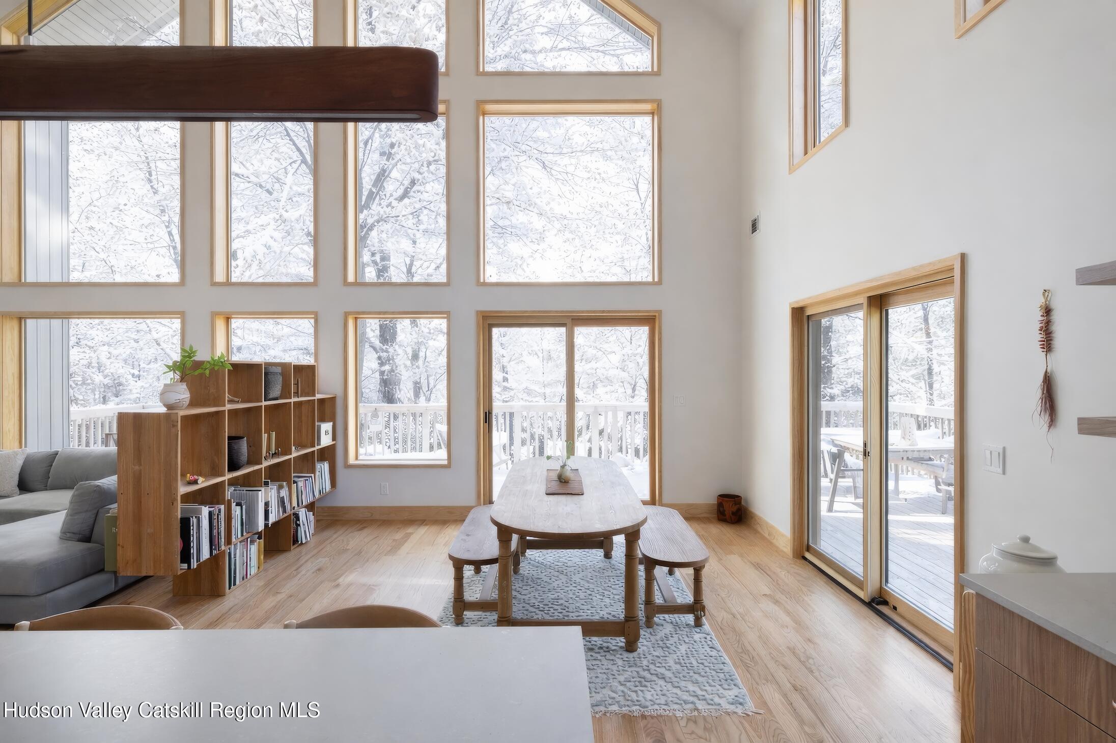 130 Abromowitz Road Wawarsing, NY 12428 - Photo 9 of 27 a living room with furniture and a large window
