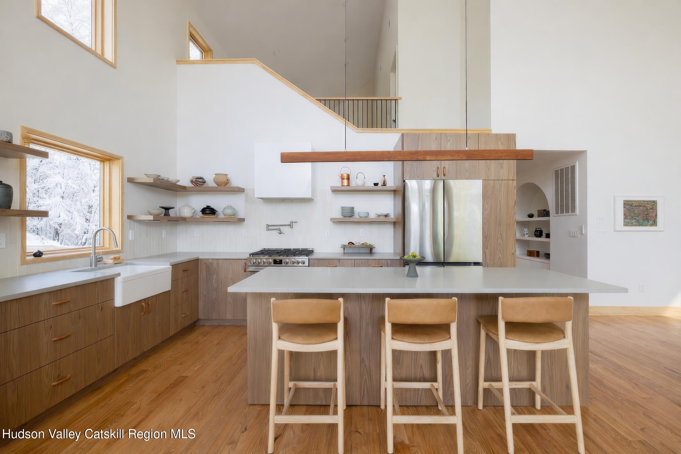 130 Abromowitz Road Wawarsing, NY 12428 - Photo 10 of 27 a kitchen with cabinets and chairs
