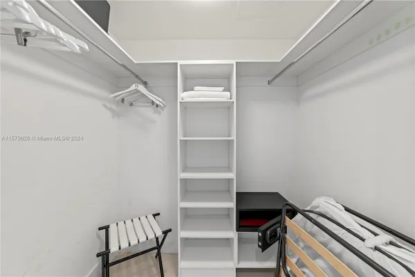 a view of a room with racks on the wall