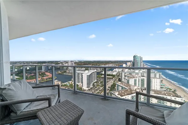 a view of a balcony with city view