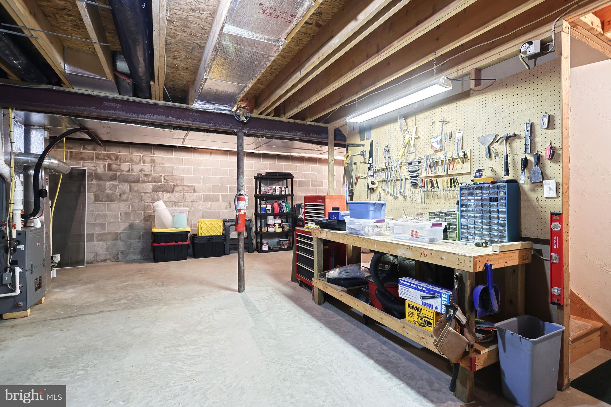 10 Larch Drive Hanover, PA 17331 - Photo 37 of 41 Work bench in lower level, walkout