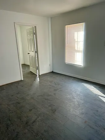 an empty room with windows