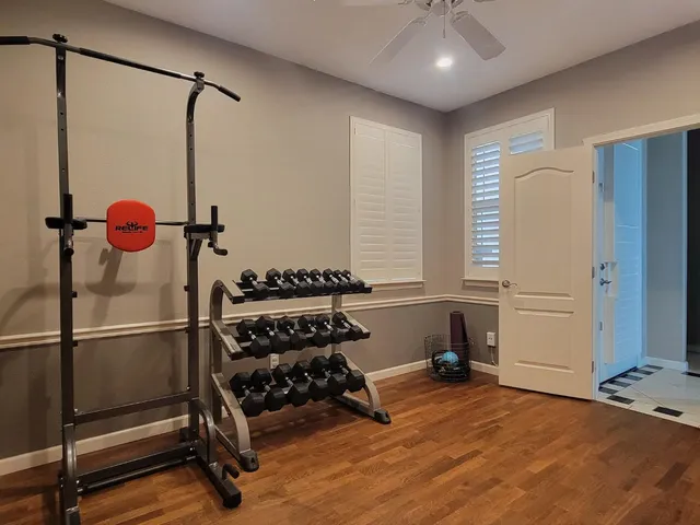a view of a livingroom with furniture and a fireplace