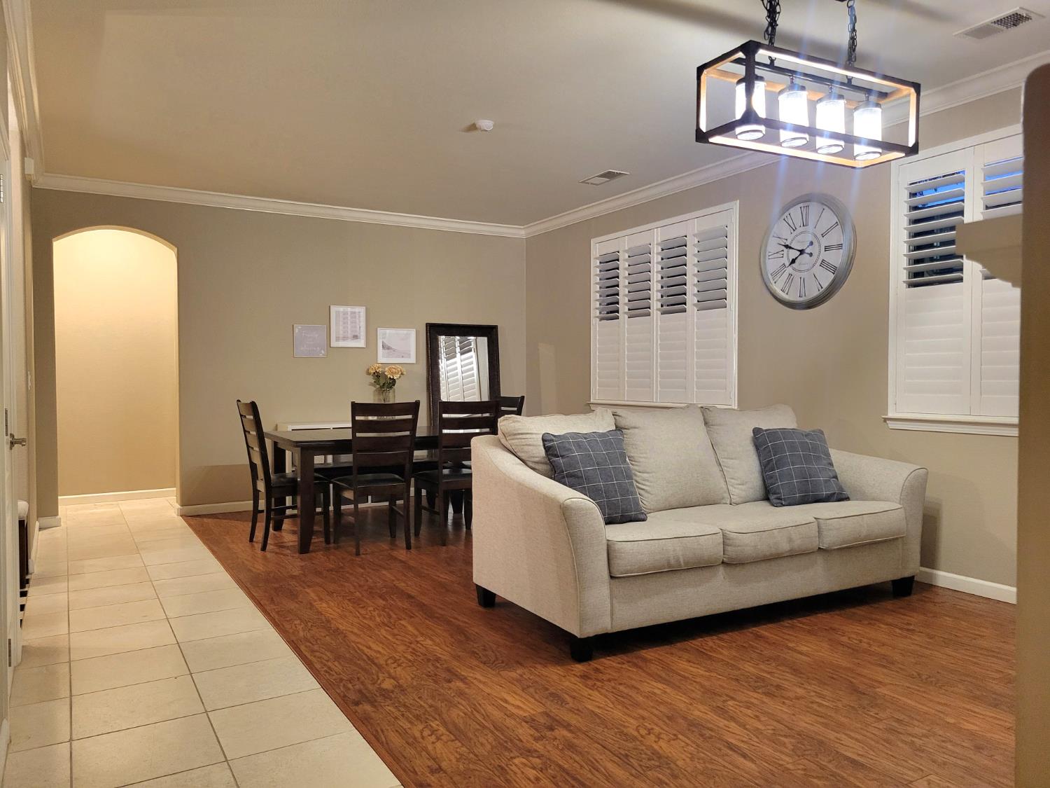1607 Three Rivers Drive Marysville, CA 95901 - Photo 14 of 47 a living room with furniture a dining table and a chandelier
