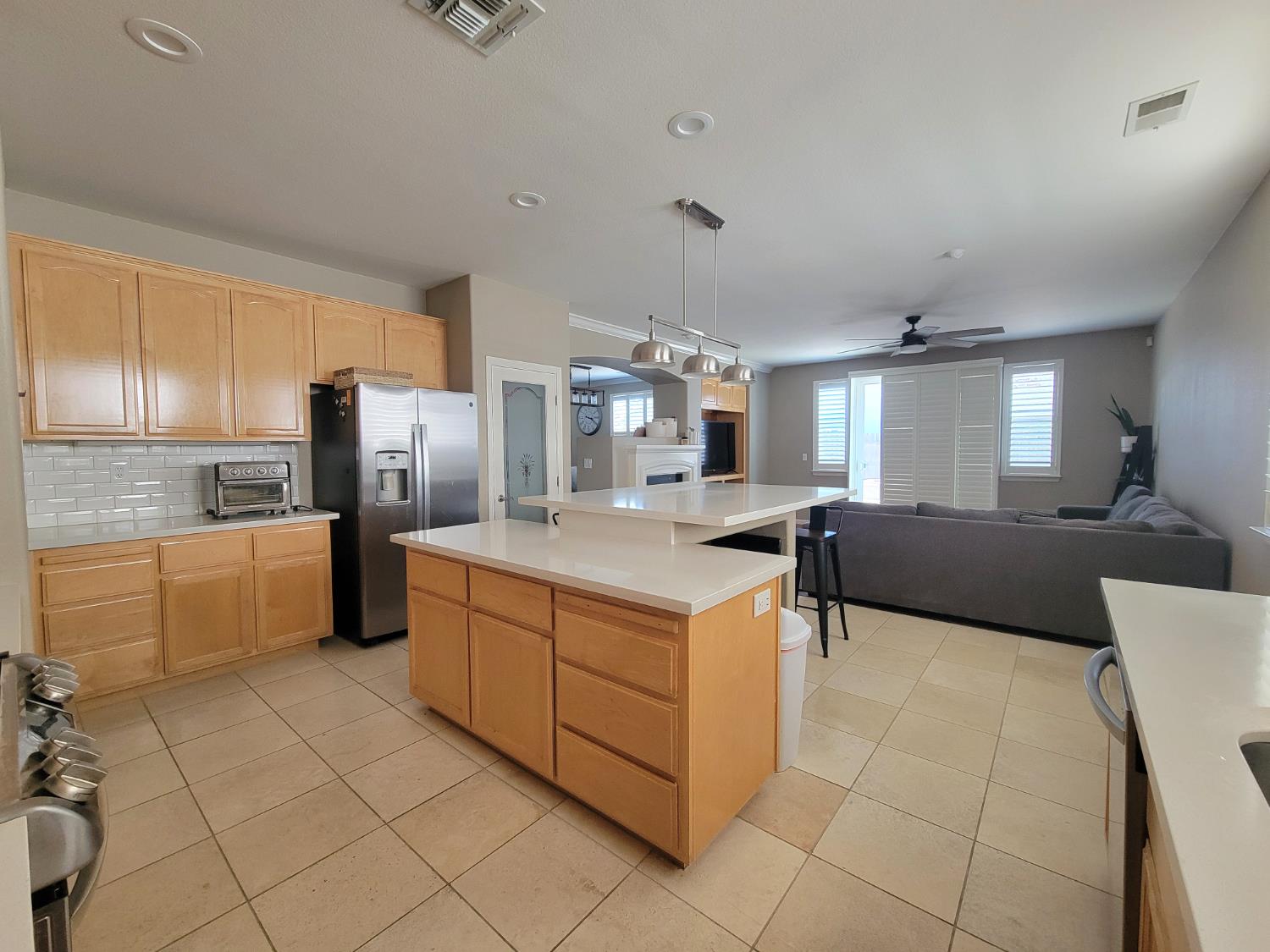1607 Three Rivers Drive Marysville, CA 95901 - Photo 22 of 47 a kitchen with stainless steel appliances a sink a counter top space cabinets and a window