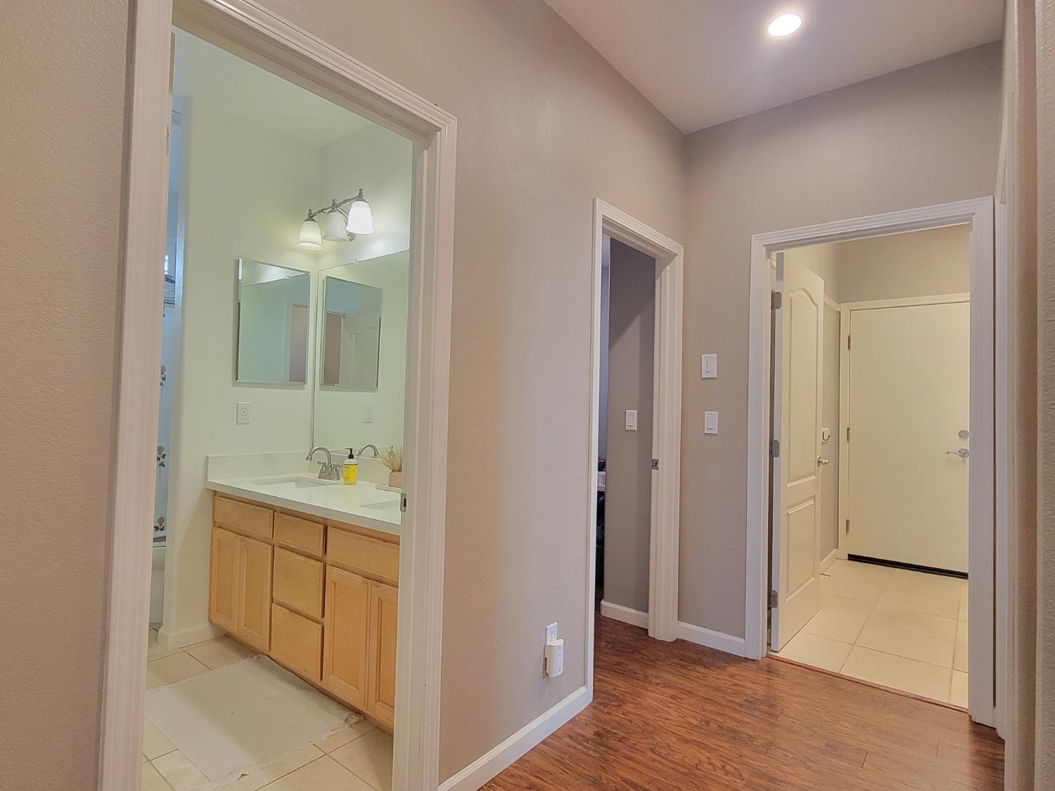 1607 Three Rivers Drive Marysville, CA 95901 - Photo 25 of 47 a view of room with mirror and dual sinks