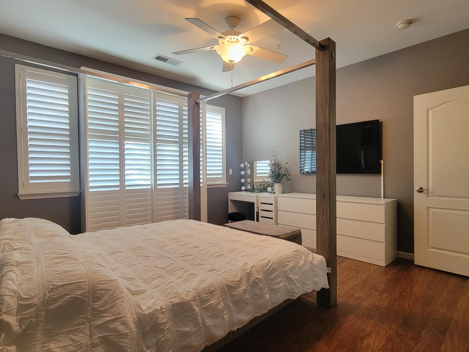 1607 Three Rivers Drive Marysville, CA 95901 - Photo 40 of 47 a bedroom with a bed and a chandelier