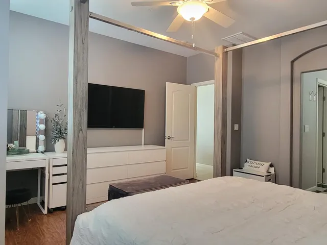 a bathroom with a glass shower door and a bathtub