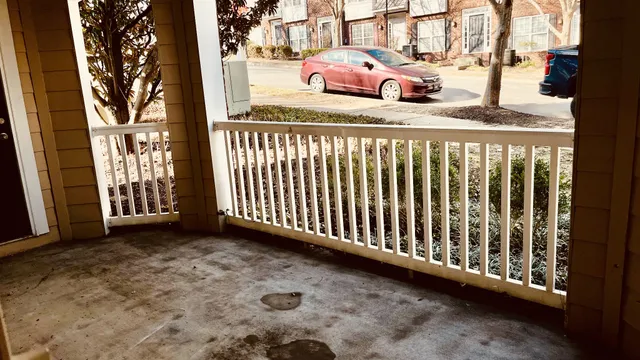 a view of a porch with a yard