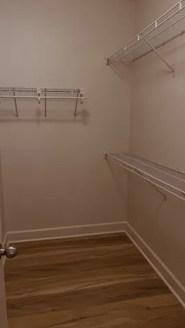 a view of a room with racks on the wall