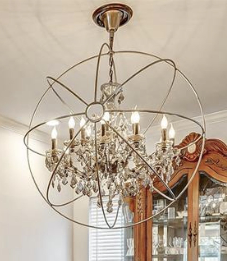 3022 Triway Lane Houston, TX 77043 - Photo 10 of 43 This stunning chandelier adds elegance and charm to the dining area.