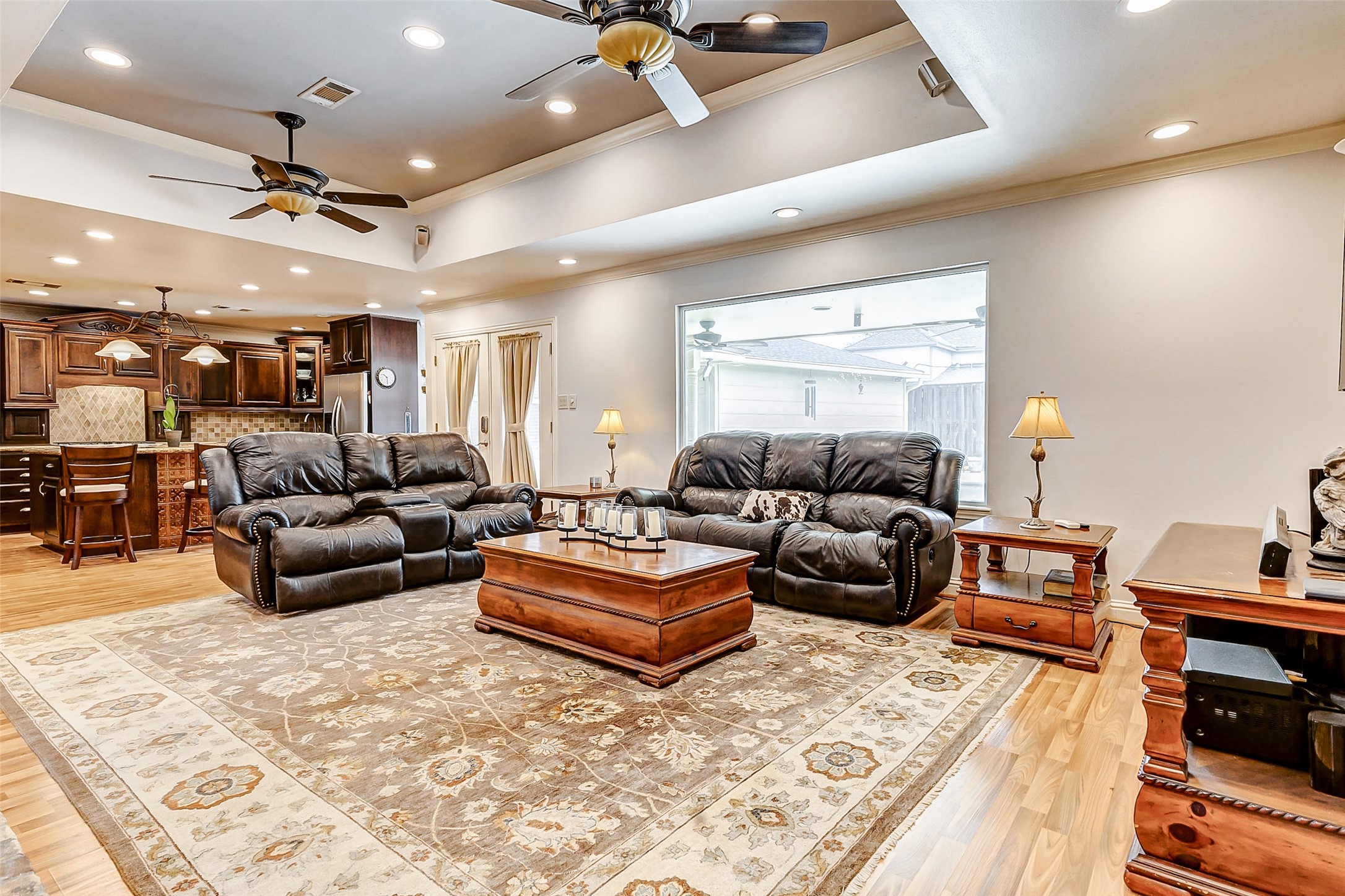 3022 Triway Lane Houston, TX 77043 - Photo 23 of 43 a living room with furniture and a flat screen tv