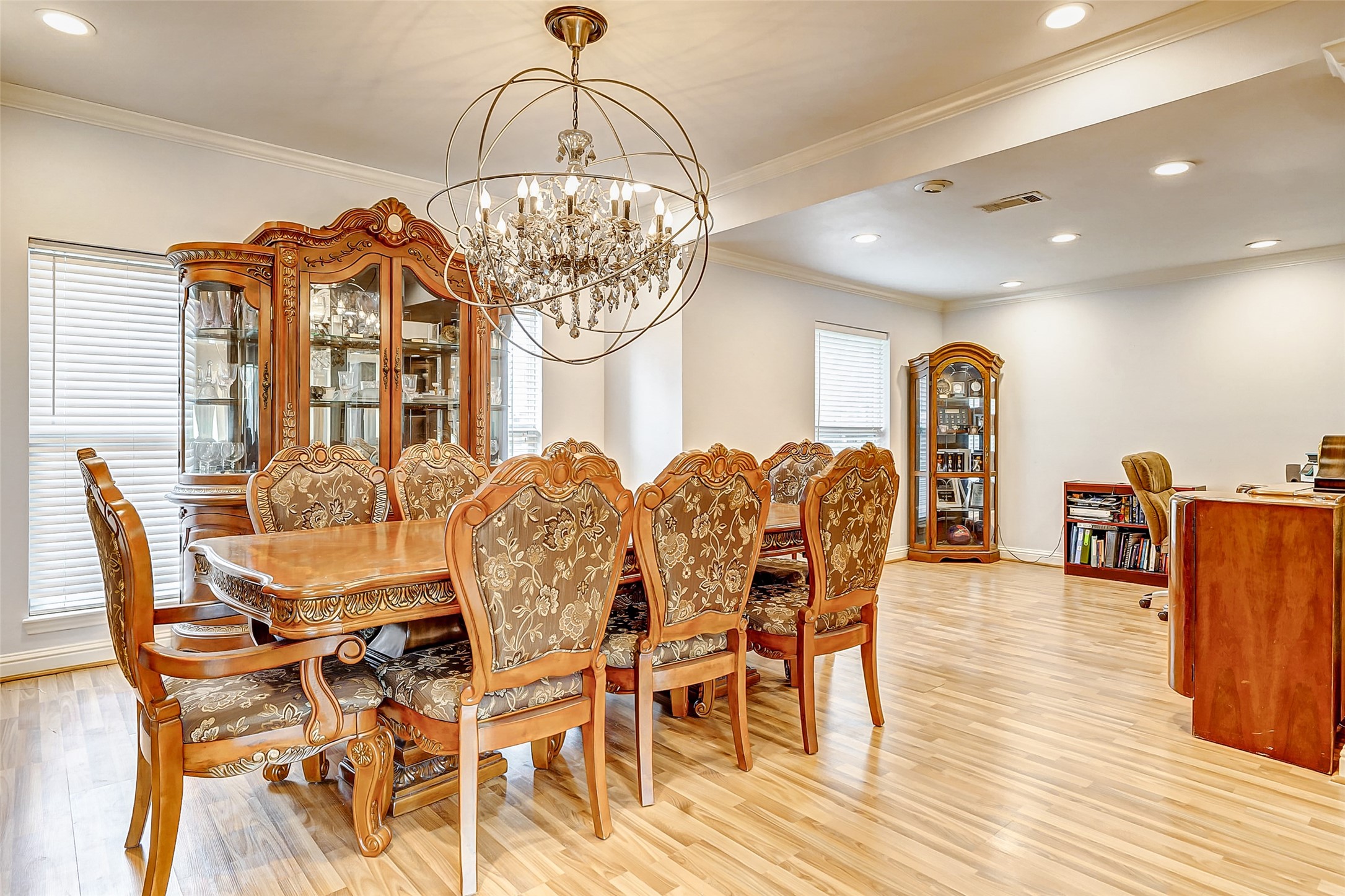 3022 Triway Lane Houston, TX 77043 - Photo 7 of 43 a view of a dining room with furniture wooden floor and chandelier