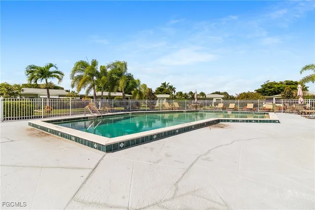 a view of swimming pool from a balcony