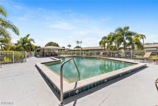 a view of a swimming pool with a terrace