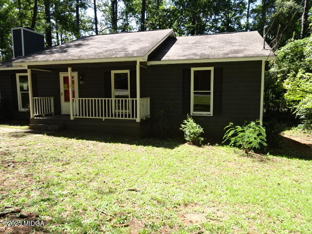 981 Santa Fe Trail Macon, GA 31220 - Photo 1 of 17 a front view of a house with a yard