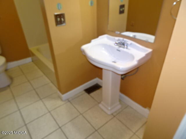 981 Santa Fe Trail Macon, GA 31220 - Photo 11 of 17 a bathroom with a sink and a mirror