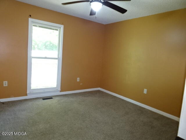 981 Santa Fe Trail Macon, GA 31220 - Photo 13 of 17 an empty room with a empty space and a window