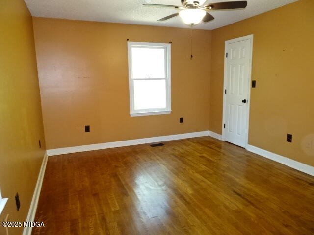981 Santa Fe Trail Macon, GA 31220 - Photo 16 of 17 a view of an empty room with window and wooden floor