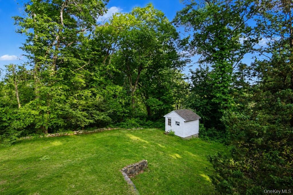 2 Troy Place Patterson, NY 12563 - Photo 32 of 49 Backyard view from balcony in primary bedroom