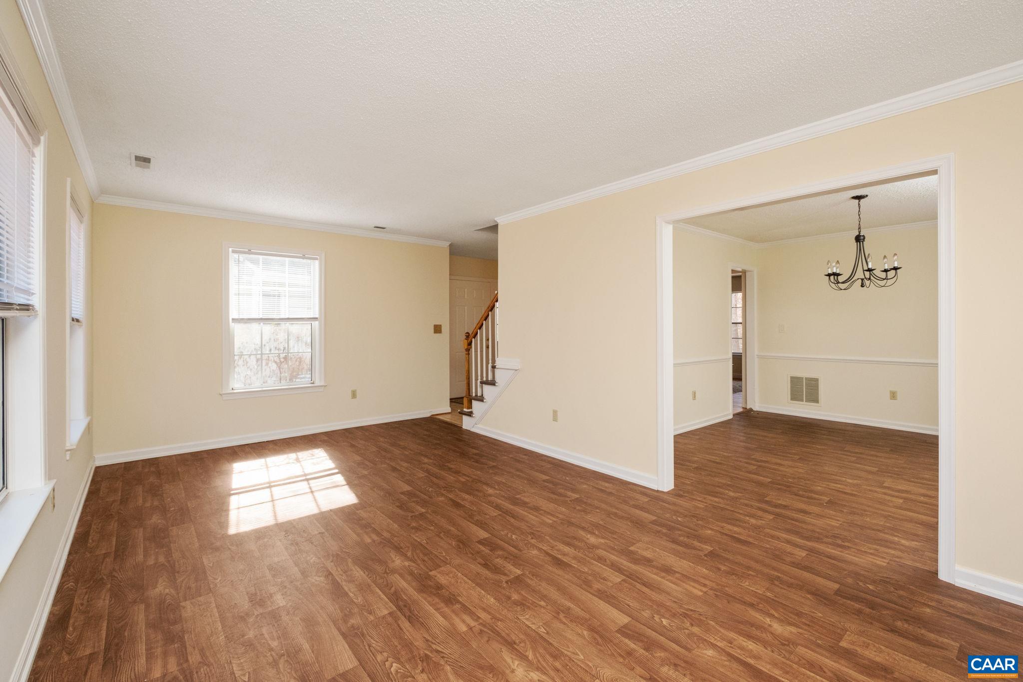 320 Westfield Road Charlottesville, VA 22901 - Photo 15 of 29 a view of empty room with wooden floor and fan