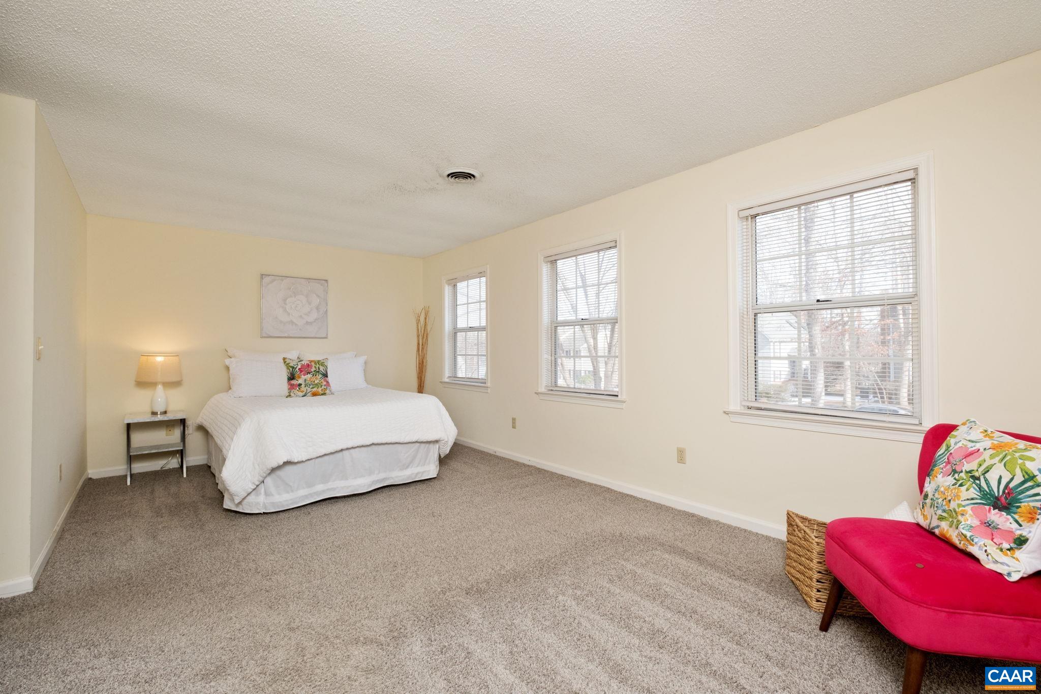 320 Westfield Road Charlottesville, VA 22901 - Photo 17 of 29 a bedroom with a bed and a window