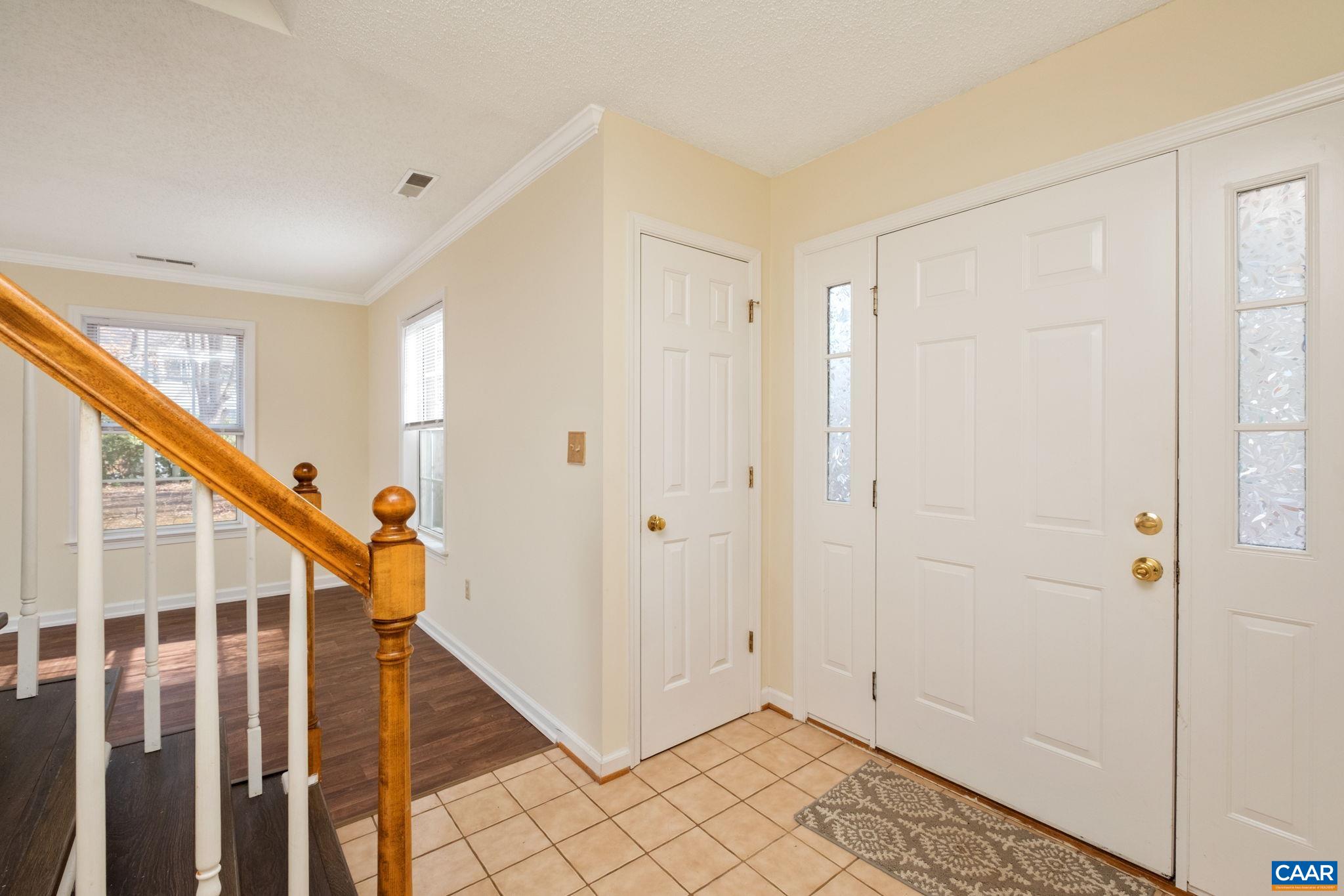 320 Westfield Road Charlottesville, VA 22901 - Photo 5 of 29 a view of an entryway with staircase