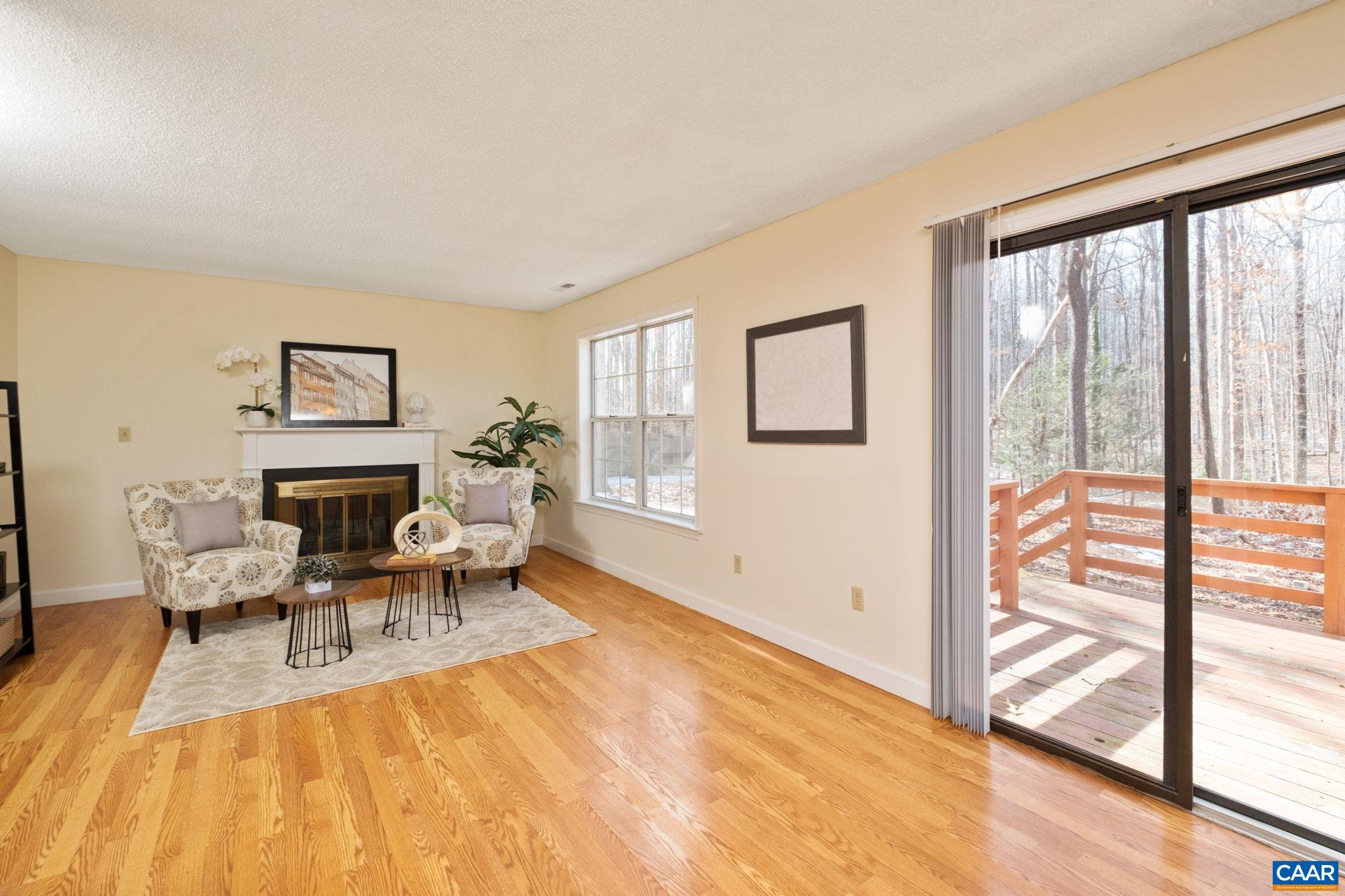 320 Westfield Road Charlottesville, VA 22901 - Photo 6 of 29 a living room with furniture and a fireplace
